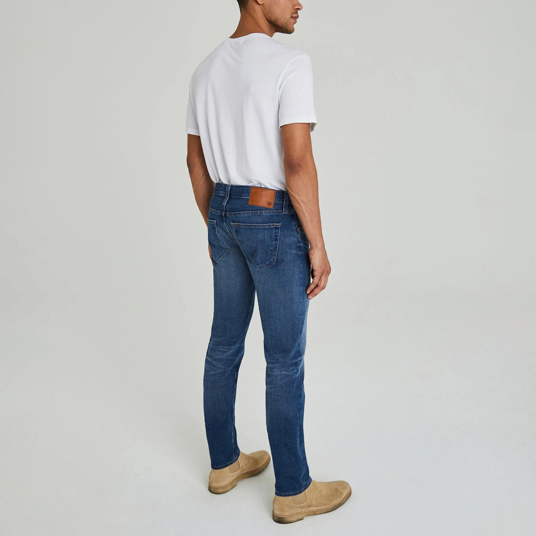 Dylan Slim 17 Years Radar Mid-Light Blue Denim - AG Jeans